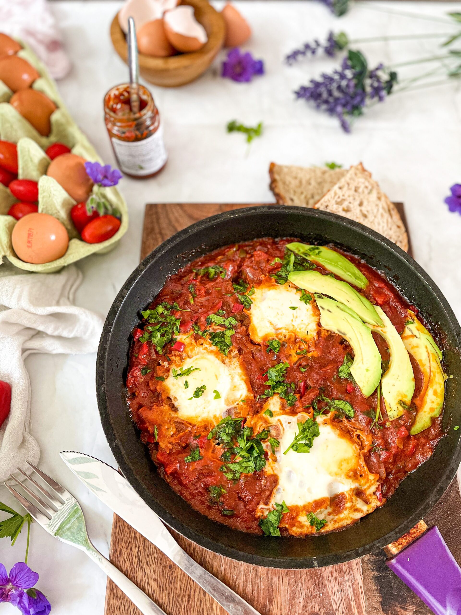 Shakshuka (Eggs poached in spicy tomato sauce)